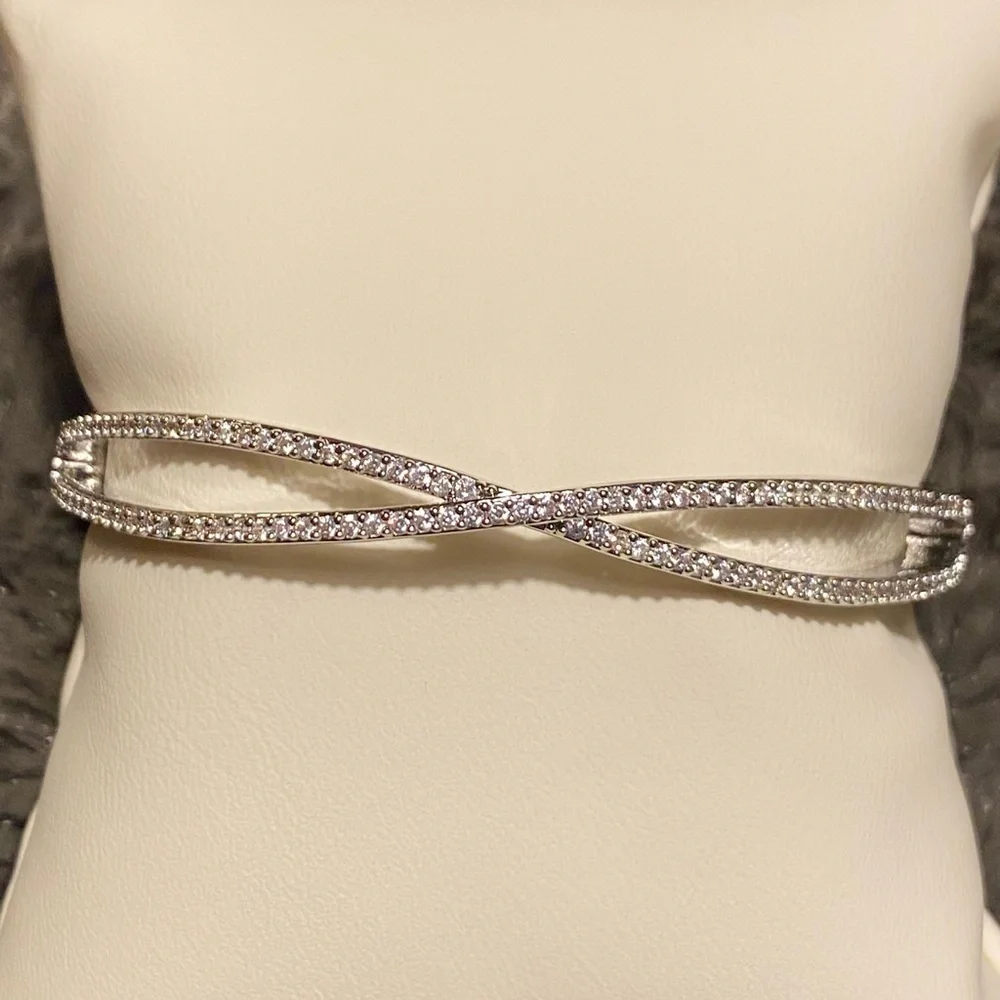 Kate spade cubic zirconia pave silver plated Infinite hinges bangle, new.